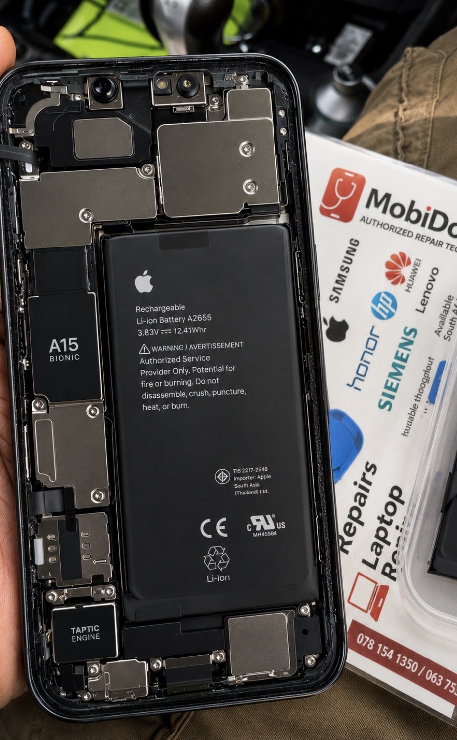 iPhone 13 battery replacement in progress at MobiDokta Danville Pretoria — OEM-grade cell